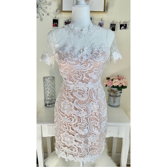 the clothing company Dresses & Skirts - White Lace Dress